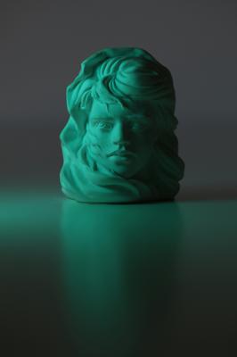 Marble bust sculpture with detailed figurative features and classical form